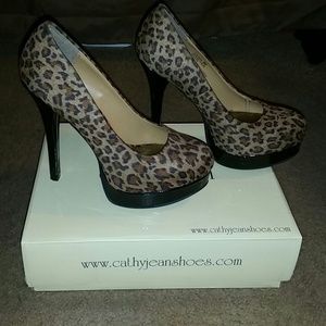Cheetah print platform pumps