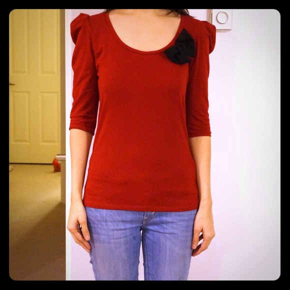 Deep red top with black bow