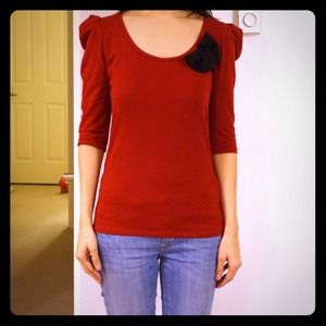 Deep red top with black bow