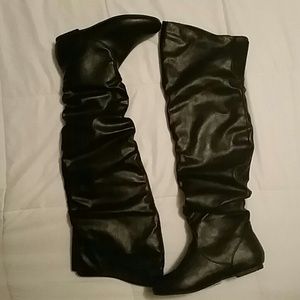 Black thigh high boots
