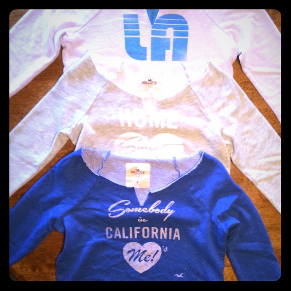 3 bundled cropped Hollister sweatshirts.