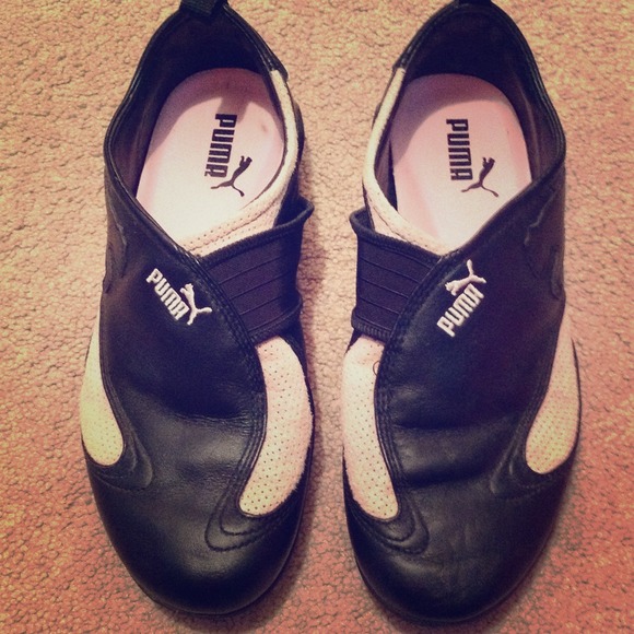 Black and pale pink leather puma slip on shoes