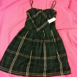 Plaid Dress flannel feel.  Fits like M NWT