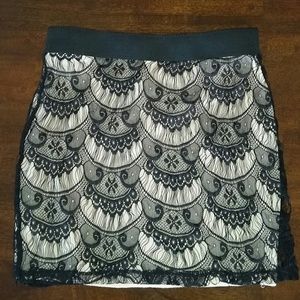 Lacey black mini skirt