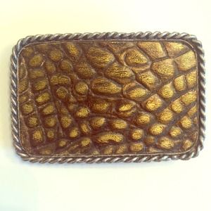 Snakeskin belt buckle.