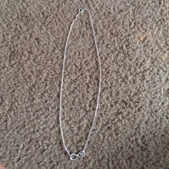 Silver infinity necklace with diamond