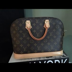 Louis Vuitton PM Alma handbag