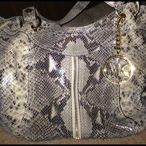Convertable Micheal kors animal print leather bag