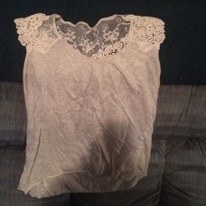 Beige top, with shoulders and upper back lace.