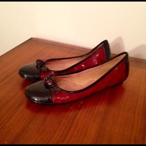 Burgundy and black patent leather flats