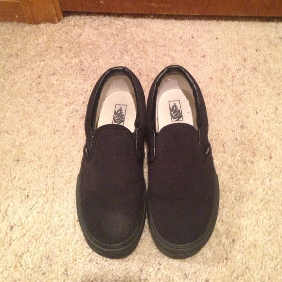 All black slip on Vans