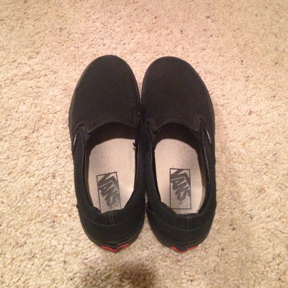 All black slip on Vans