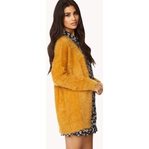 Yellow fuzzy sweater