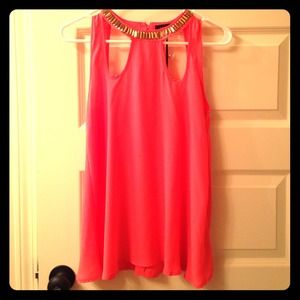 Bright coral sleeveless top