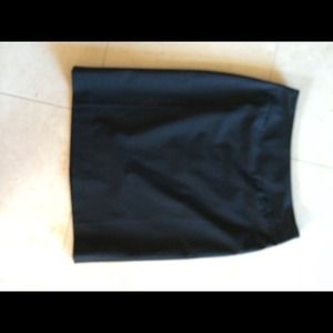 Black, lined mini skirt. Never worn.