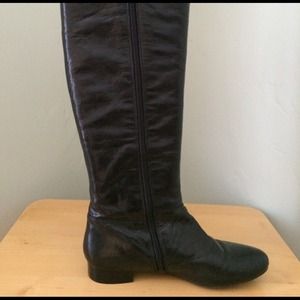 Knee high leather boots.