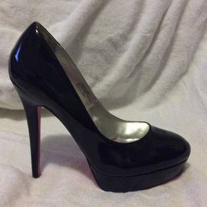 Shoe Dazzle black and pink bottoms pumps