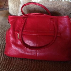 Never used red satchel with double handle & strap
