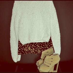 Polka dotted short pleated Black and Tan skirt.