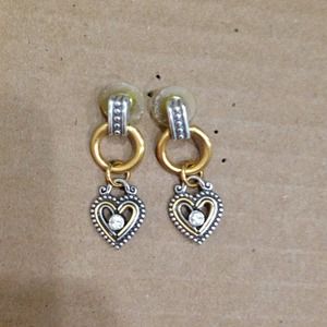 Gold and silver earrings by Brighton