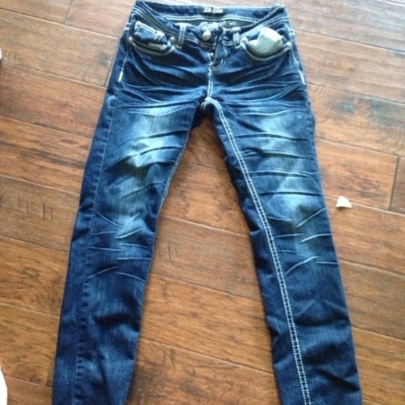 Dark wash jeans.