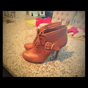 Cute brown boots from Aldo, only worn a few times.