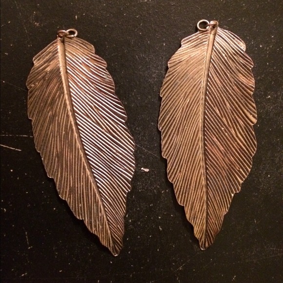 Cute metal gold colored feather earrings