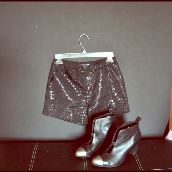 Black Croc printed hot pants.