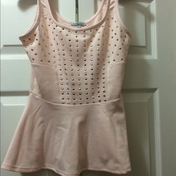 Light pink peplum top with gold studded detailing