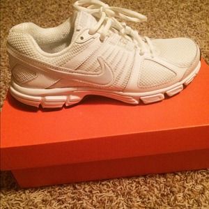 All white Nike tennis shoes👟