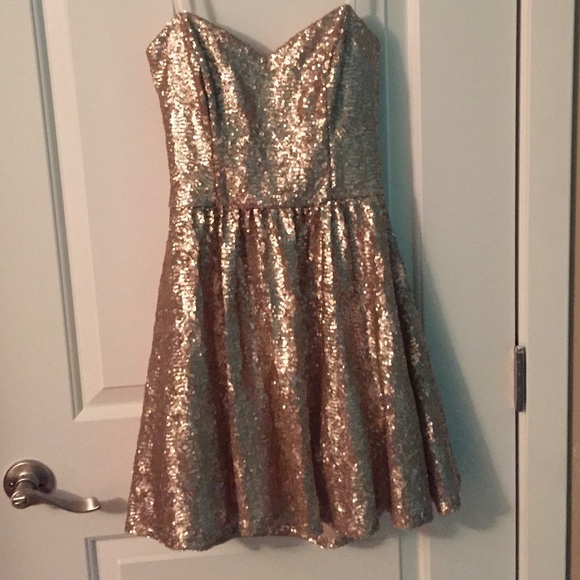 Strapless gold sequin dress