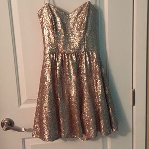 Strapless gold sequin dress