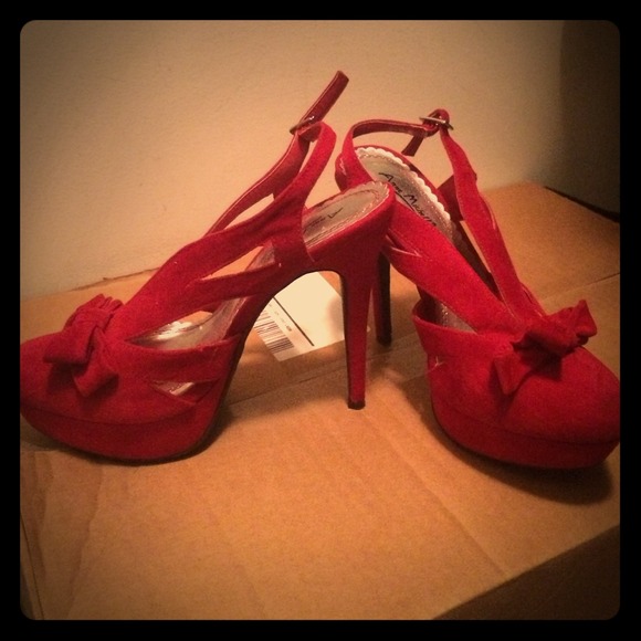 Red suede bow heels