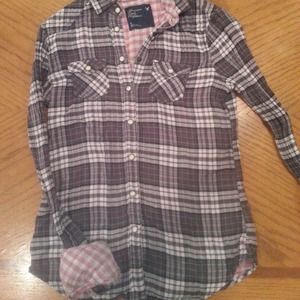 Long sleeve plaid shirt.