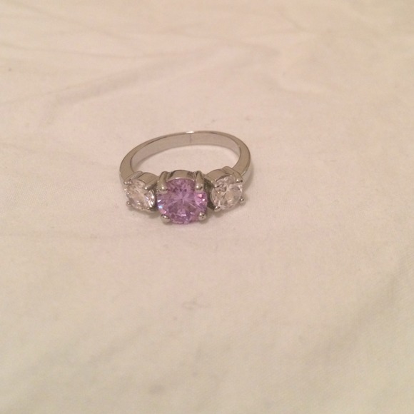Gorgeous purple and clear stone ring!