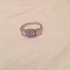 Gorgeous purple and clear stone ring!