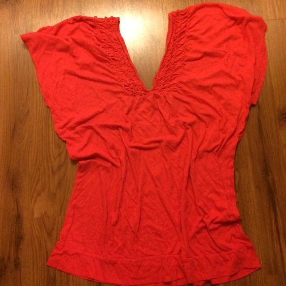 OLD NAVY V-neck ruffled shirt.