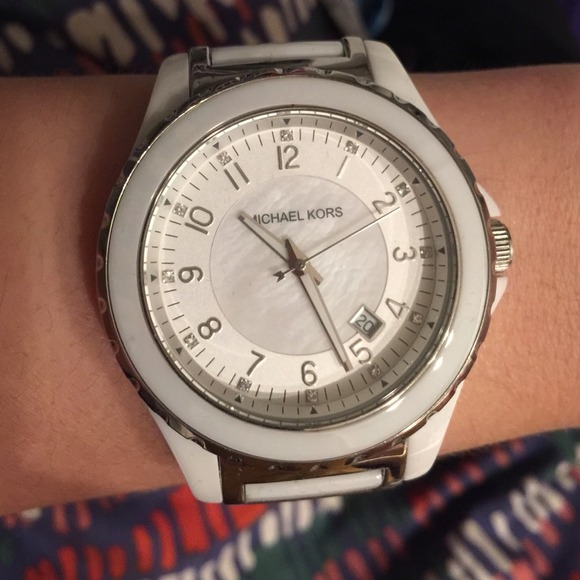 White & silver authentic Michael Kors watch.