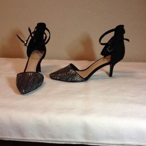 Silver and black shoe