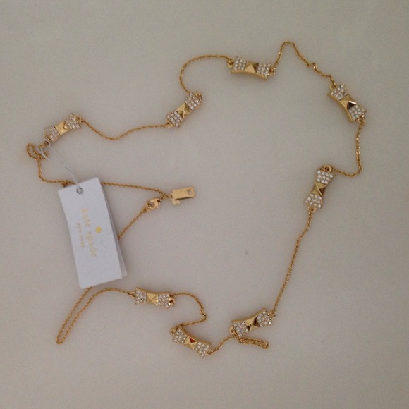 Kate Spade long gold bow necklace