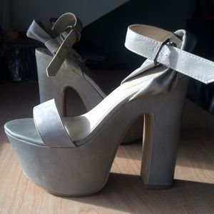 C. Label Beige Platform Heels
