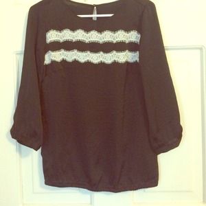 Silky black blouse with white lace