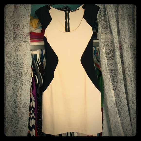 Beige colored dress with black shoulders & hips