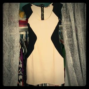 Beige colored dress with black shoulders & hips