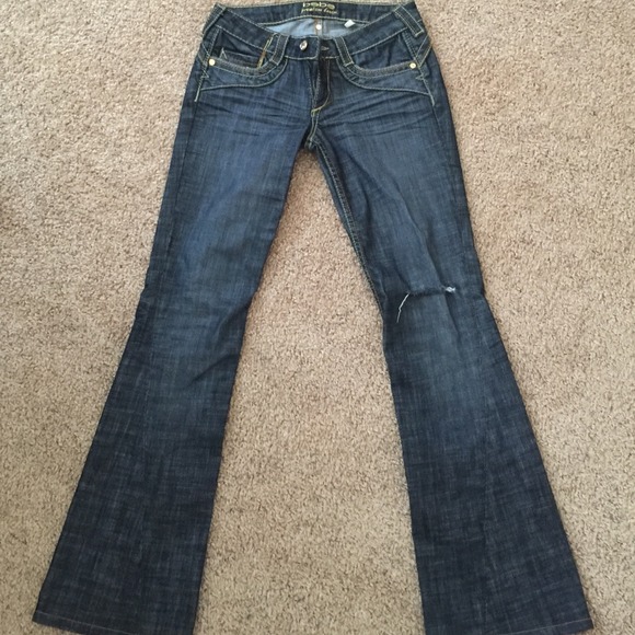 BEBE jeans with gold embellishments