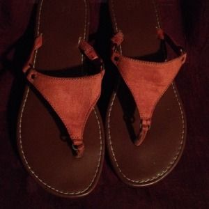 Orange and brown leather and orange sandals