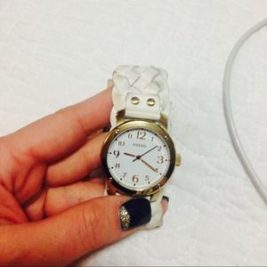 Women's white fossil watch.