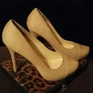 Tan pumps with tan toe