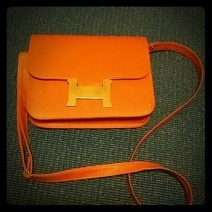 Orange bag.  Bought here in PM..never used it.