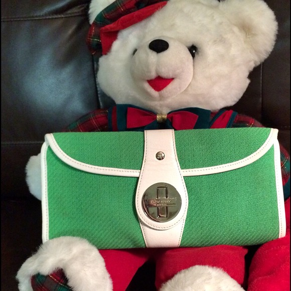 Gently used Kate Spade green and white clutch
